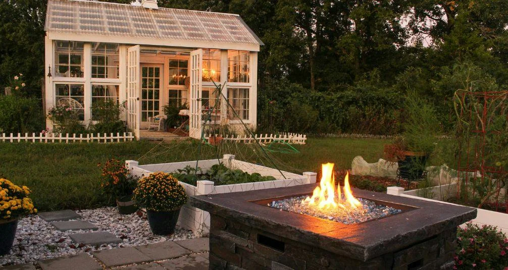 Square fire pit table in beautiful garden