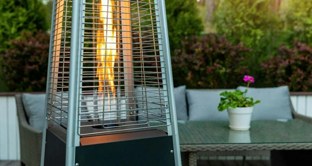 Close up of pyramid gas flame heater in garden