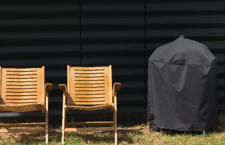 Two Deck Chairs beside Covered Heater